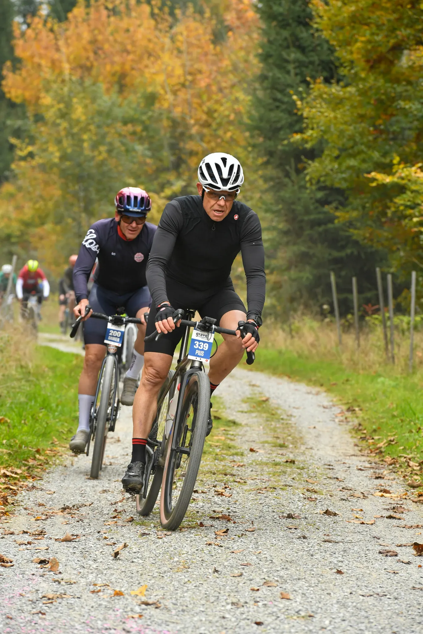 Pius racing on a Swiss gravel road in autumn
